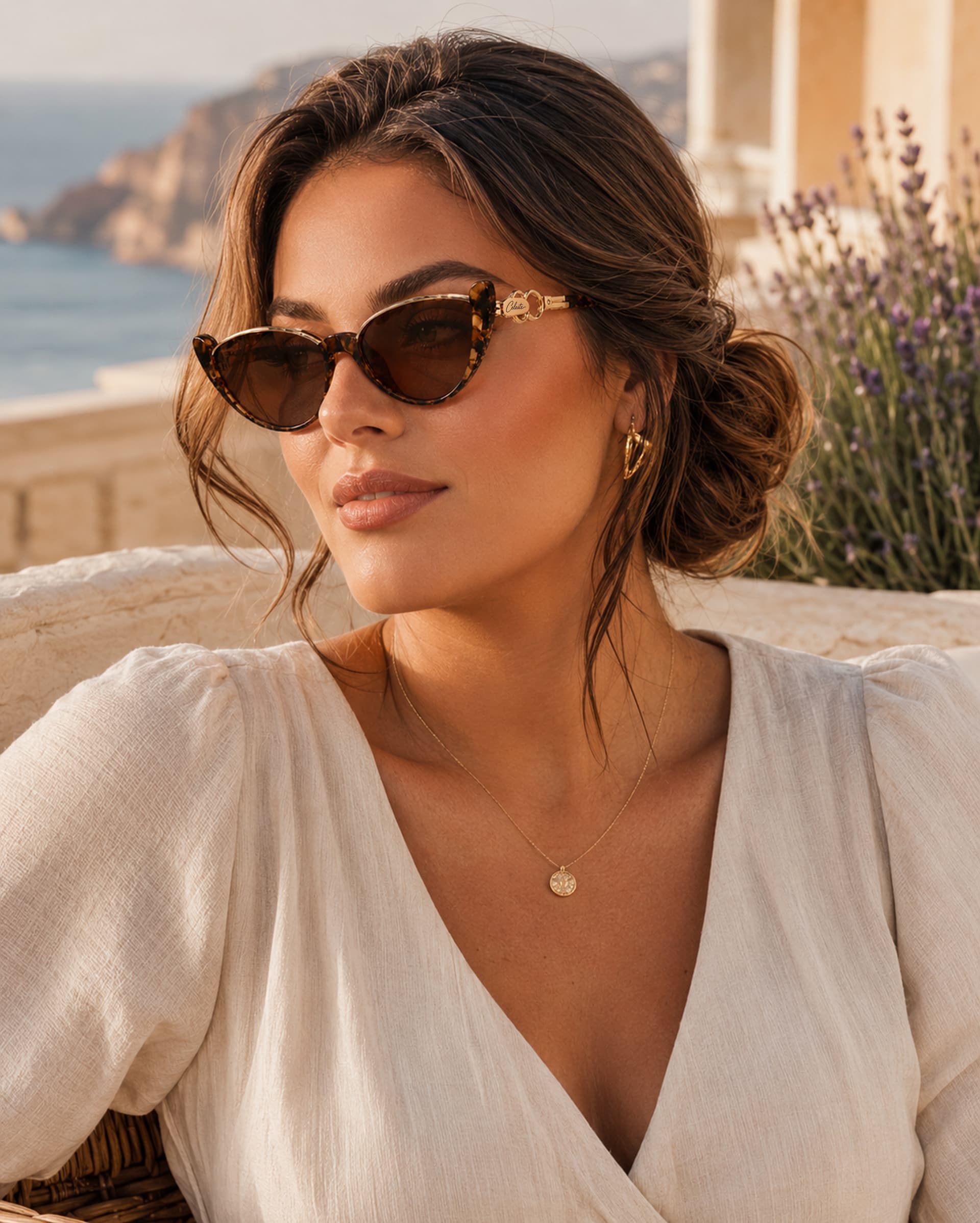 Model wearing dark Celeste eyewear beneath a sunlit archway